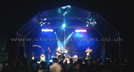 covered stage hire lighting and pa package for event